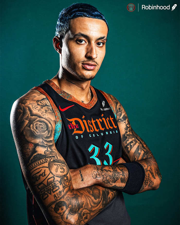 Kyle Kuzma poses in new 2023 Washington Wizards City Edition Uniforms